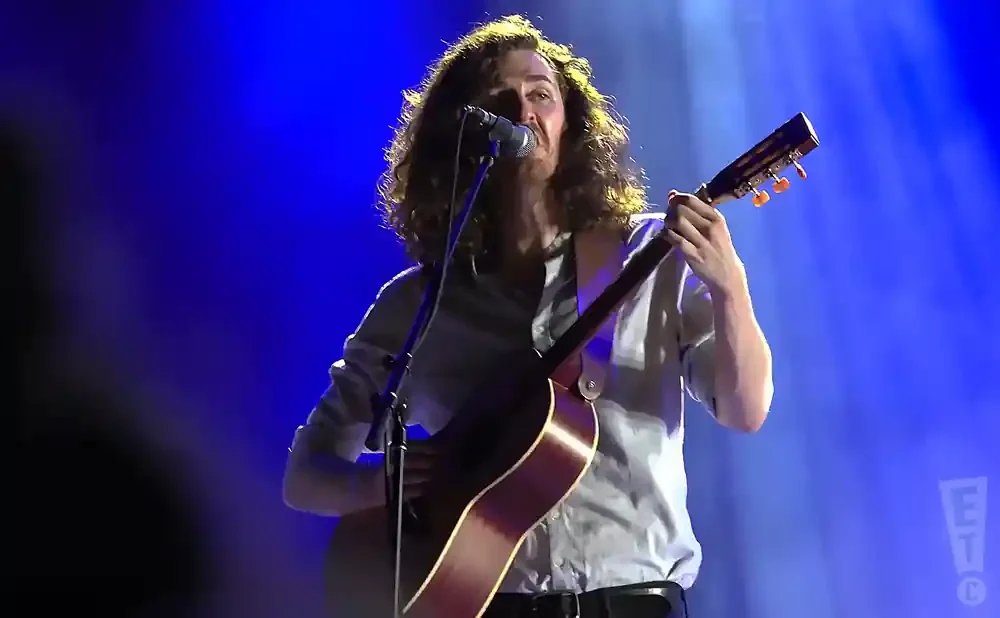 An empty concert stage with a microphone stand waiting for the Hozier tour.