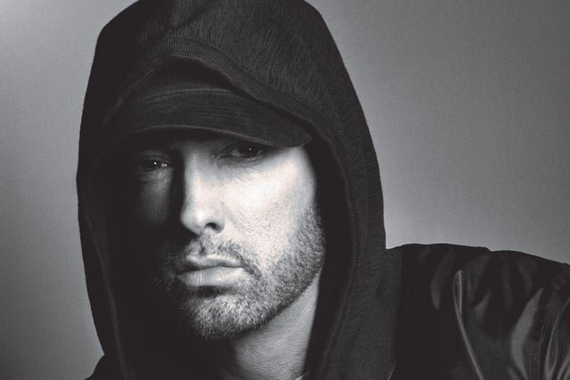 An empty stadium stage ready for a future Eminem tour performance.