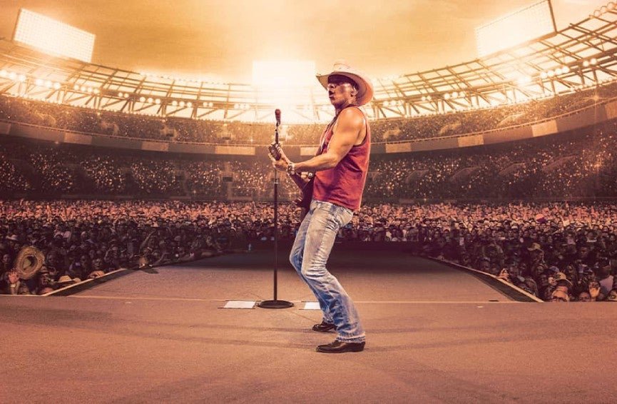 An empty stadium stage ready for a major Kenny Chesney concert performance.